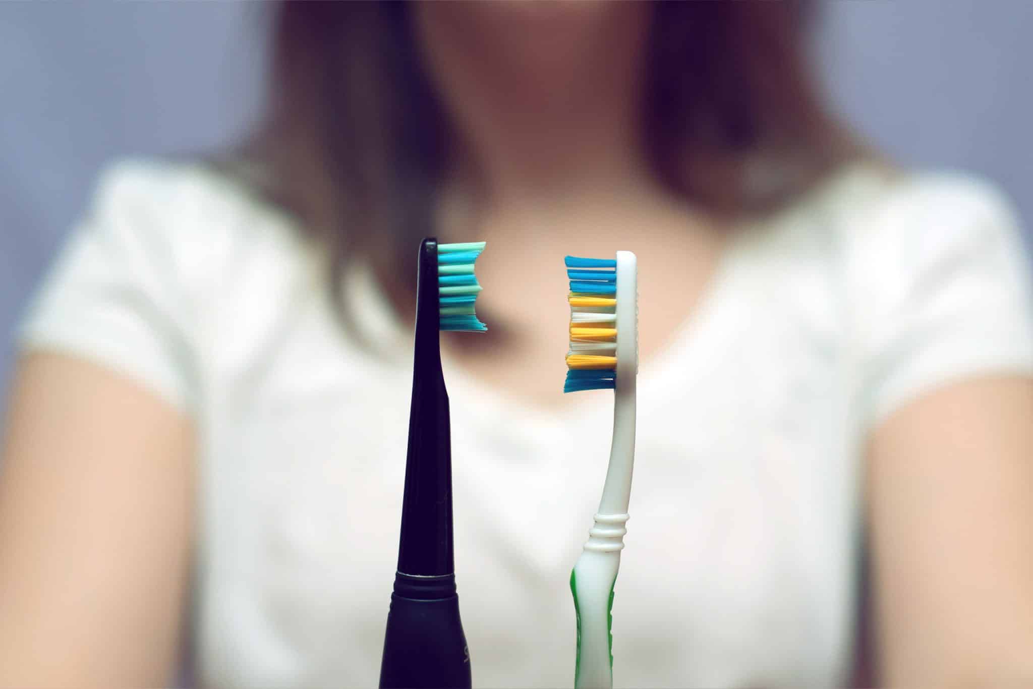 Electric vs Manual Toothbrush Header