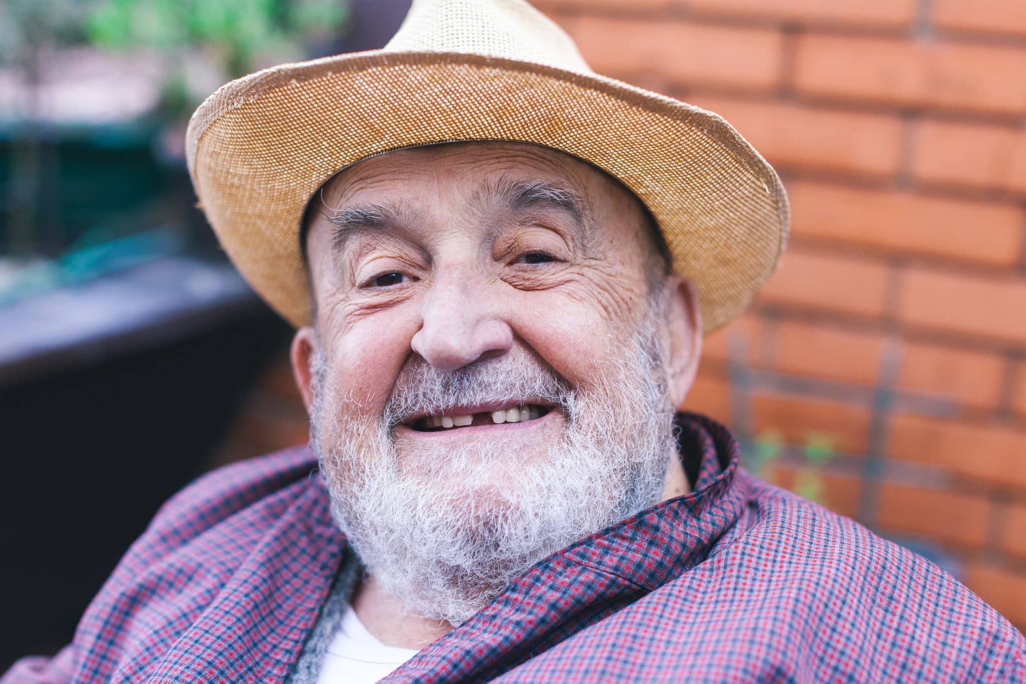 A picture of a man missing his tooth.