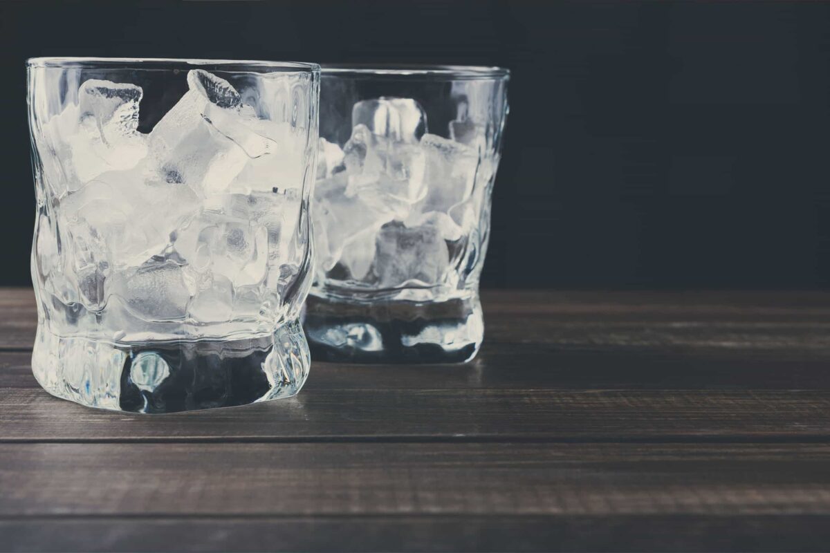 Two glasses filled with only ice.